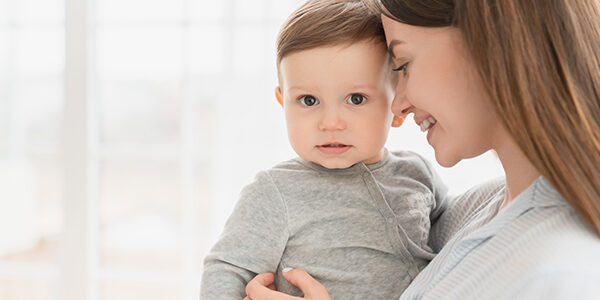 Happy family moments with mother mom. Single young mother holding embracing hugging