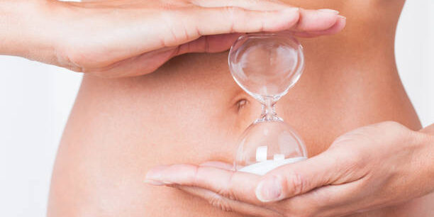 belly of a woman with an hourglass